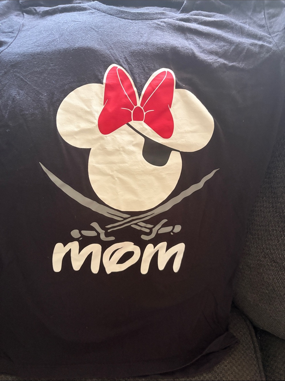 Disney Black Tee with White Minnie Skull Graphic and Red Bow